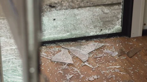 Window frame with broken glass close-up Stock Footage 111975517