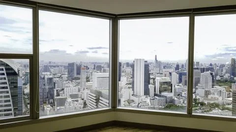 Window frame with building city background, Skyline Buildings from window off Stock Photos