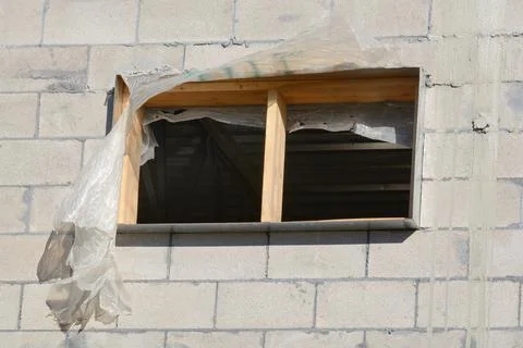 Window frame  in cinder block building Stock Photos