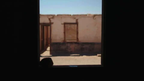 Window frame with stone, building opposite, rack focus Stock Footage 337874630