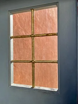 Window Frame With Sunlight And Bars Stock Photos