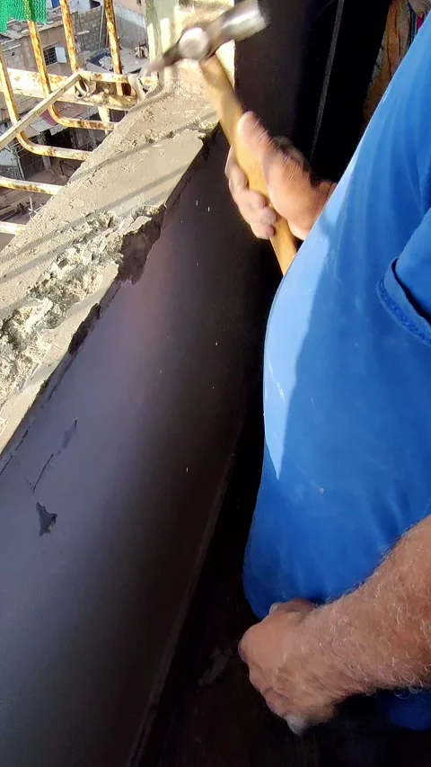 Window frame wall breaking with hammer for repair Stock Footage 332589609