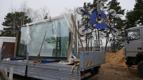 Window frames are being prepared for installation. Stock Footage 293218152