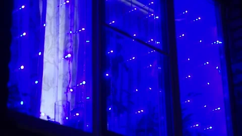 Window with a garland Stock Footage 163566864