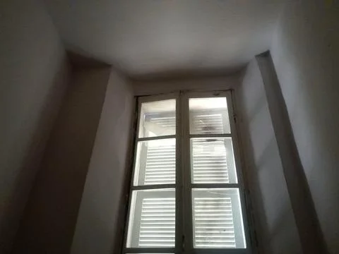 Window give some bright light in living room in building Stock Photos