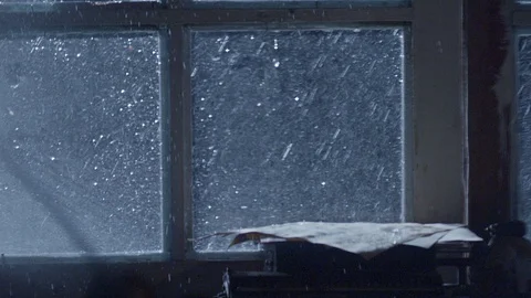 Window glass breaking during rainy weather . Thunder lightning Through Window Stock Footage