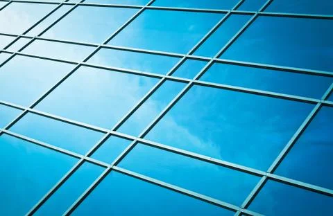 Window glass reflection of cloudy sky Fotos Stock