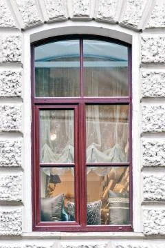 Window on the gray wall. Stock Photos