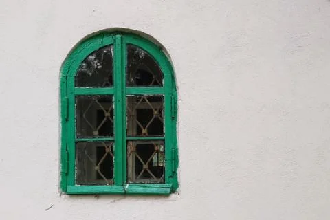 Window with a green frame. Stock Photos