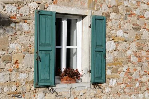 Window with green shutters Stock Photos