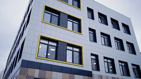 Window grids contrast with crisp clean wall paneling system Vídeos de archivo 335643625