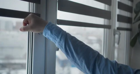 Window handle lock with key in man hands. Home safety window lock for baby Stock Footage 148433411