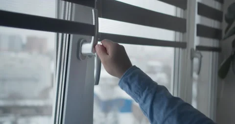 Window handle lock with key in man hands. Home safety window lock for baby Stock Footage 148433561