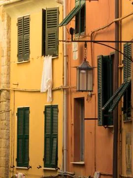 Window with hanging clothes Stock Photos