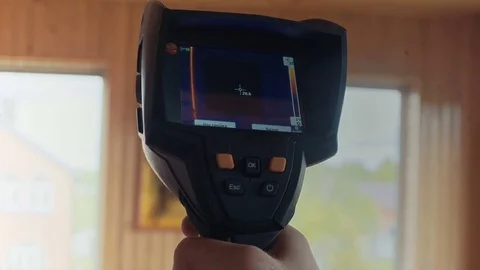 Window heated, the readings of a thermal imager Stock Footage 76711292