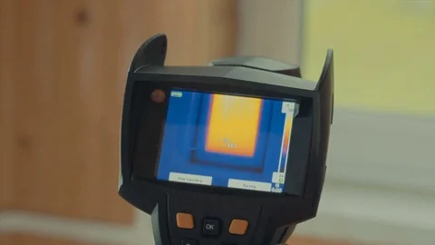 Window heated, the readings of a thermal imager Stock Footage 76734485