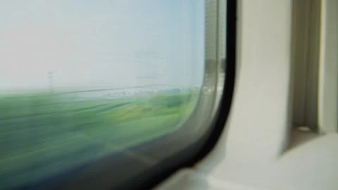 Window of high‑speed train traveling at high speed Stock Footage 341496570
