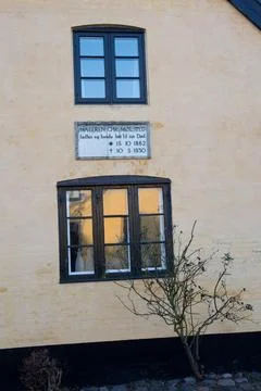 Window of a house in an old village of Dragoer nearby Copenhagen in Denmark Stock Photos
