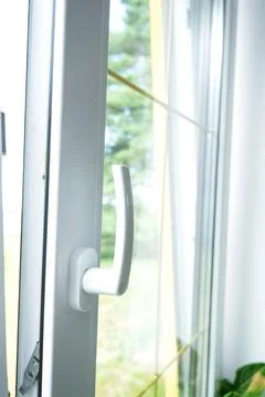 Window from inside the house plastic double-glazed window view outside to t.. 스톡 사진