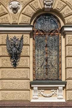 Window with iron grating. Stock Photos