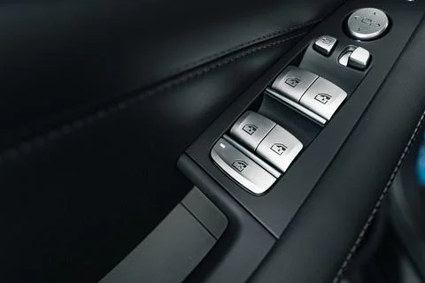 Window lifter button in a luxury car Photos