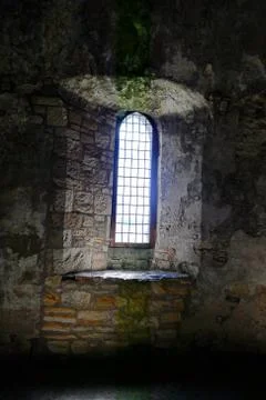 Window with light in an old castle - incholm abbey Stock Photos