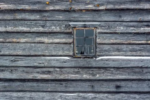 Window on a log wall. Stock Photos