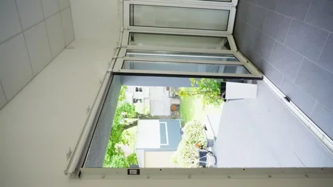 Window mechanism opening and closing in neutral interior space Video stock 343543254