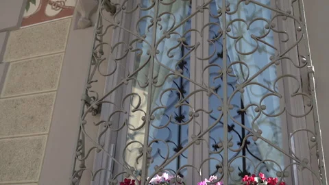 Window with metal bars. Metal construction. Stock Footage 256045443
