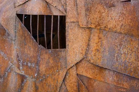 Window in metal construction. Background from rusty metal. Beautiful texture Foto stock