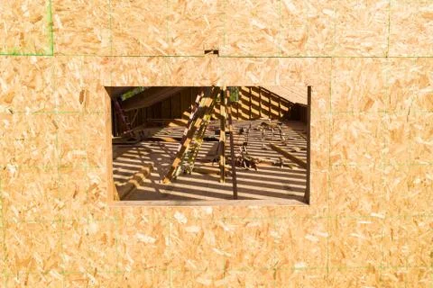 Window of a new construction home looking inside 스톡 사진