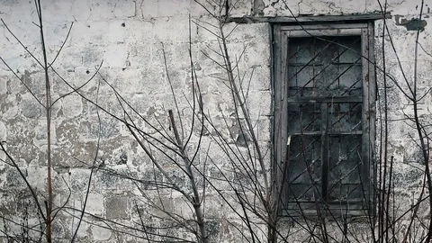 Window of an old abandoned house Stock Footage 83677814