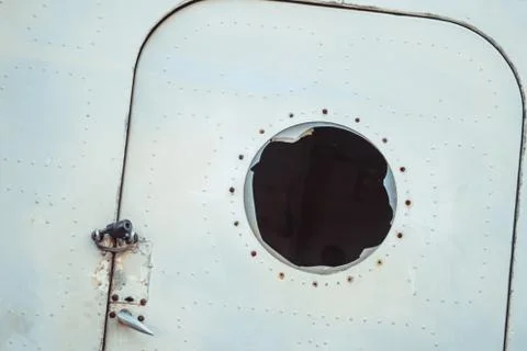 Window of old aircraft Photos