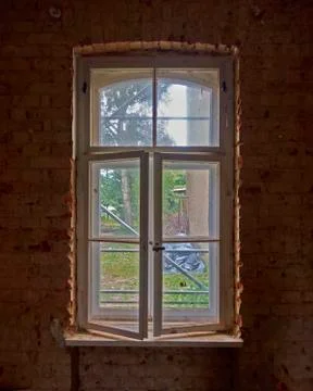  window on old brick wall Stock Photos