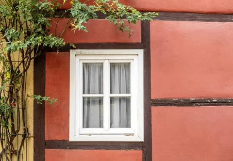 Window in an old half timbered house with creeper Stock Photos