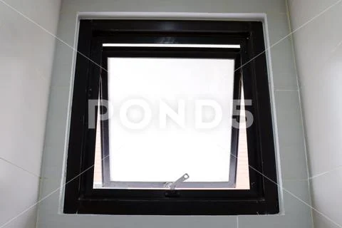 Window old open of detention center on wall Stock Photos