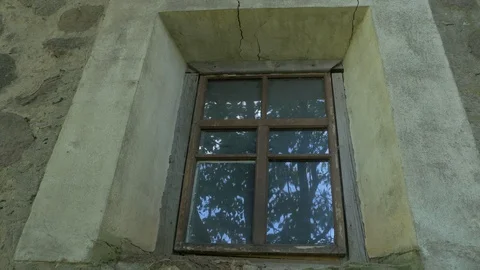Window of an old stone building Video stock 102310929