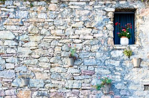 Window in old typical stone wall Stock Photos