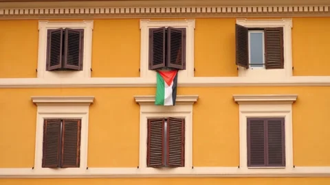 Window with Palestinian flag displayed in Rome, Italy Stock Footage 318134065
