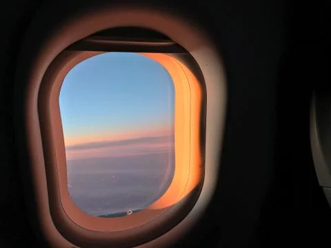 Window of passenger jet Stock Photos