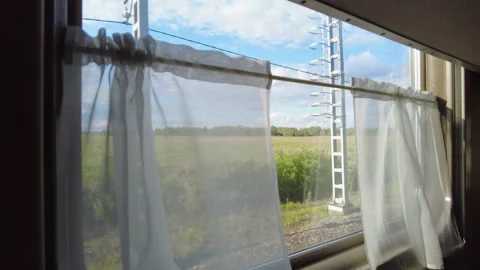 Window of a passenger train in motion. Stock Footage 250469904