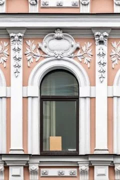 Window on the pink wall. Stock Photos