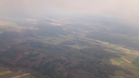 From the window of the plane. Flight along the clouds. Stock Footage 107829301