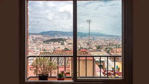 Window plate view on sleeping quarters of Barcelona, top view, time-lapse, day Stock Footage 279458700