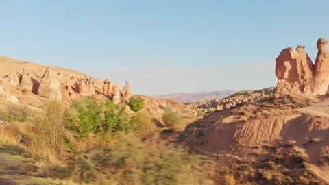 Window point of view driving in cappadocia outdoors on sunrise with devrent v Stock Footage 165932558