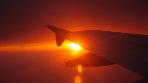 Window point of view of the sunrise in a plane. Location Paris early morning. Wi Stock Footage 90744961