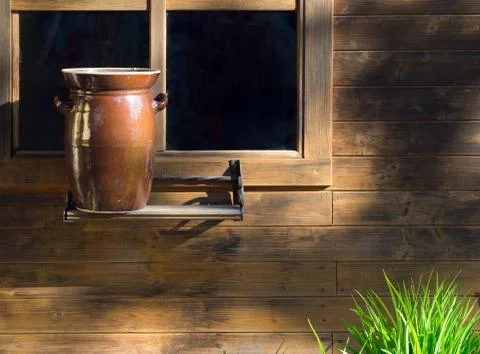 Window with a pot of grass Stock Photos