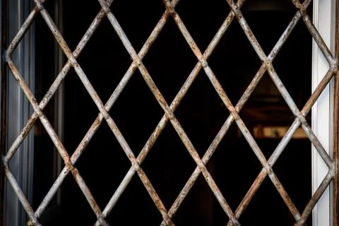Window with protection grate Stock Photos