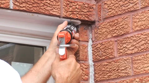 Window protection with Sealant Stock Footage 133617843