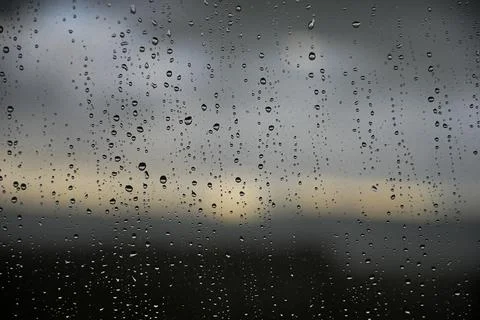 Window with raindrops during rain 11 Stock Photos